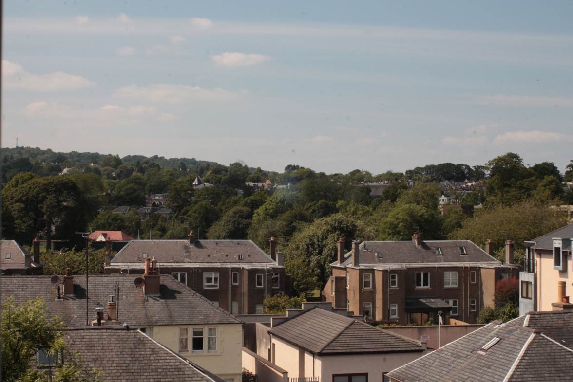 A picture containing outdoor, sky, house, town